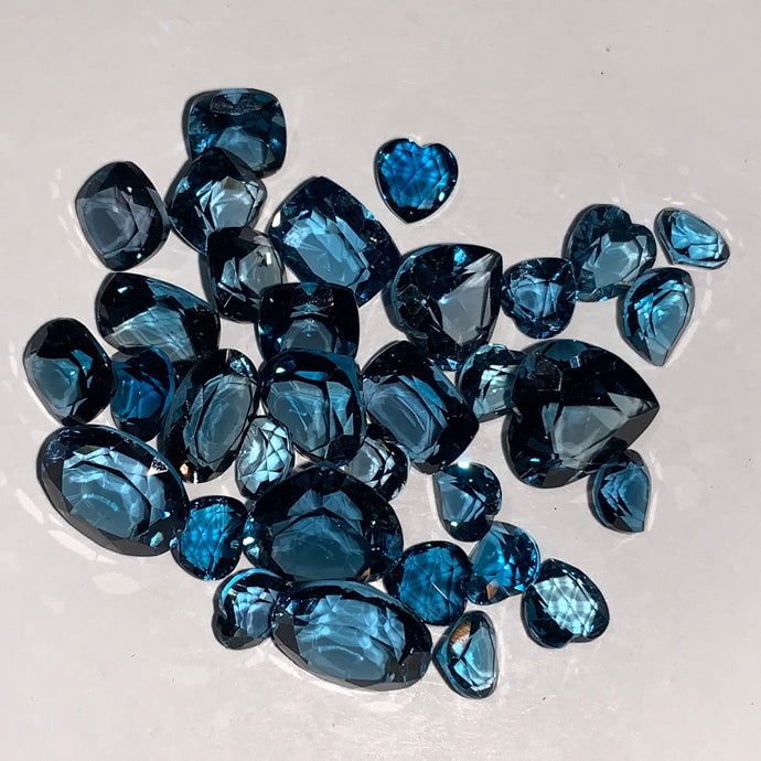 Faceted London Blue Topaz - Mixed Sizes (10 Carat Lot)